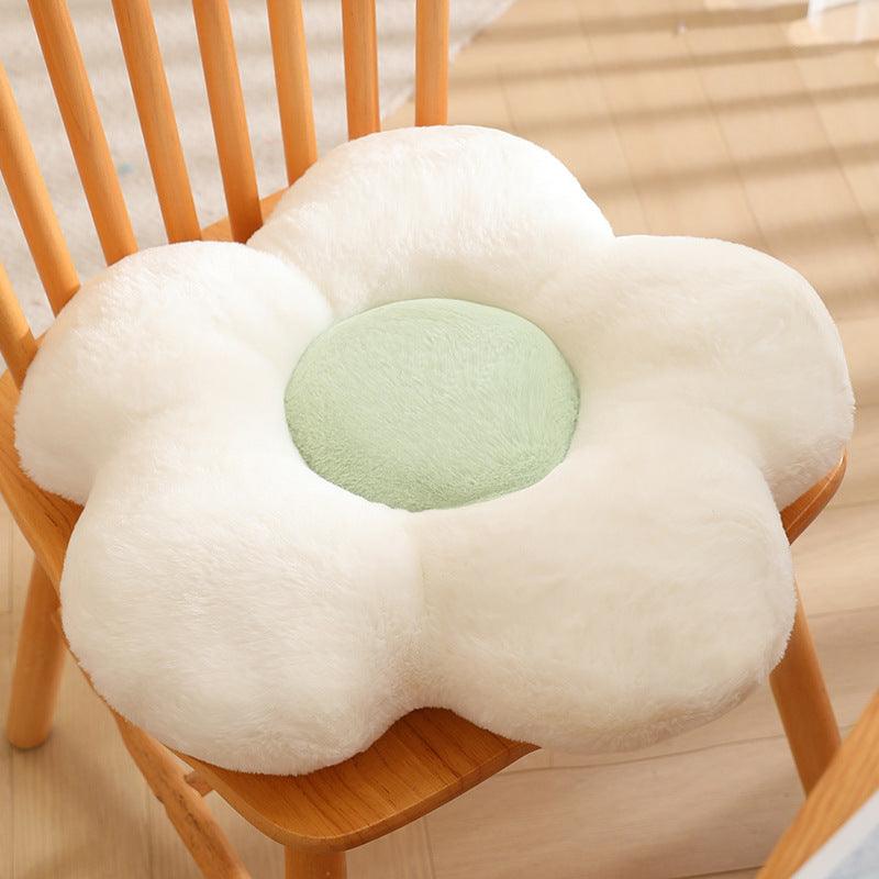 A soft petal-shaped pillow in cream white color.